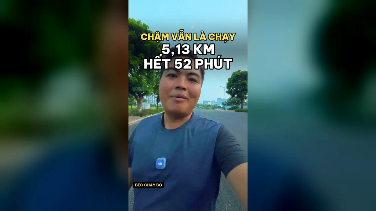 Mình chạy sáng ở Hà Nội, chữ trên ảnh: chậm vẫn là chạy, 5,13 km hết 52 phút